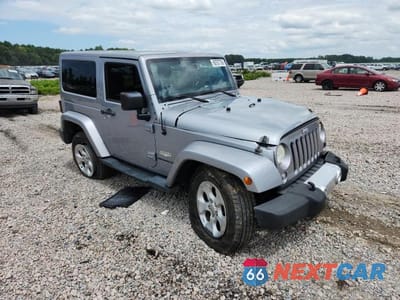 Czwarte zdjęcie samochodu z boku: 2014 JEEP WRANGLER SAHARA VIN:1C4AJWBG6EL258558 - miniatura
