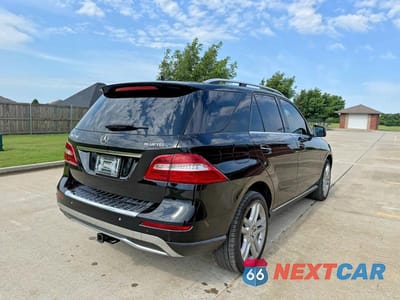 Czwarte zdjęcie samochodu z boku: 2015 MERCEDES-BENZ ML 250 BLUETEC VIN:4JGDA0EB1FA503026 - miniatura
