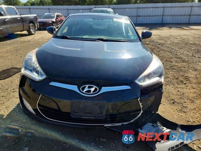 Piąte zdjęcie samochodu w środku: 2015 HYUNDAI VELOSTER BASE VIN:KMHTC6AD7FU232293 - miniatura