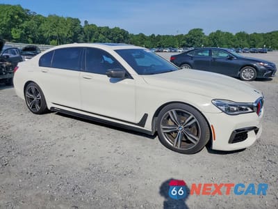 Czwarte zdjęcie samochodu z boku: 2017 BMW 750 XI VIN:WBA7F2C3XHG423411 - miniatura