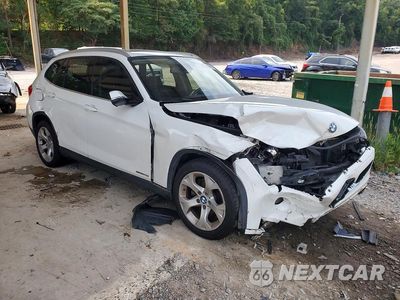 Czwarte zdjęcie samochodu z boku: 2014 BMW X1 SDRIVE28I VIN:WBAVM1C59EVW55465 - miniatura