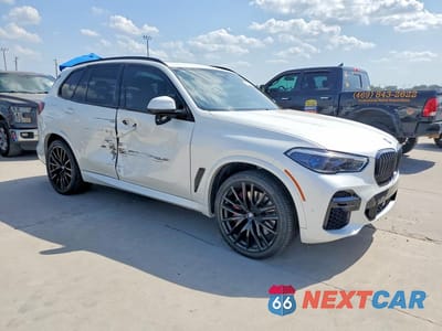 Czwarte zdjęcie samochodu z boku: 2022 BMW X5 M50I VIN:5UXJU4C00N9K17187 - miniatura