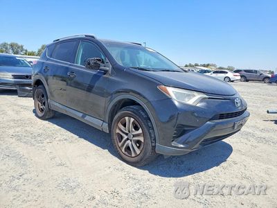 Czwarte zdjęcie samochodu z boku: 2016 TOYOTA RAV4 LE VIN:2T3ZFREV4GW244173 - miniatura