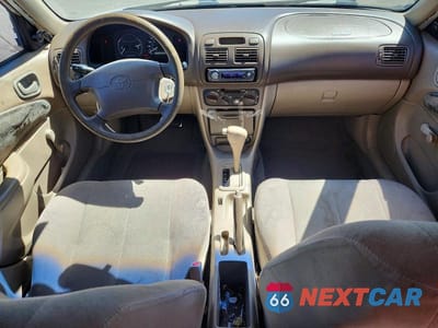 Zdjęcie 8 z 12 samochodu: 1999 TOYOTA COROLLA VE VIN:1NXBR12E1XZ140053 - miniatura