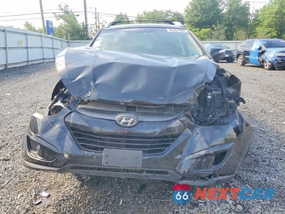 Piąte zdjęcie samochodu w środku: 2012 HYUNDAI TUCSON GLS VIN:KM8JU3AC4CU471502 - miniatura