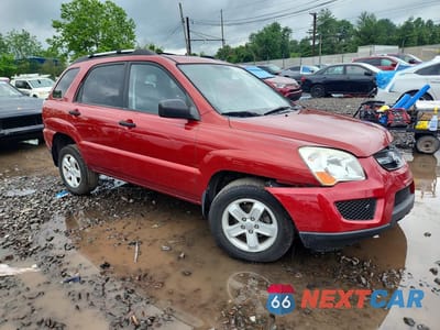 Czwarte zdjęcie samochodu z boku: 2010 KIA SPORTAGE LX VIN:KNDKGCA30A7701063 - miniatura