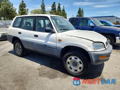 Czwarte zdjęcie samochodu z boku: 1997 TOYOTA RAV4 BASE VIN:JT3GP10V3V0018659 - miniatura