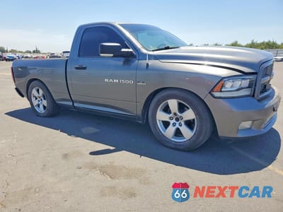 Czwarte zdjęcie samochodu z boku: 2012 DODGE RAM 1500 ST VIN:3C6JD6AT7CG136234 - miniatura