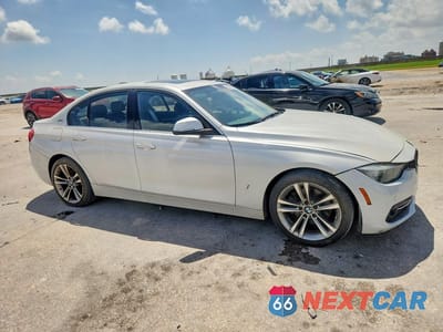 Czwarte zdjęcie samochodu z boku: 2017 BMW 330E VIN:WBA8E1C52HK480041 - miniatura