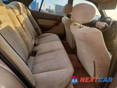 Zdjęcie 10 z 12 samochodu: 1994 TOYOTA CAMRY LE VIN:4T1GK12E8RU048824 - miniatura