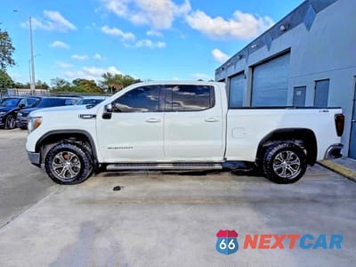 Zdjęcie 12 z 15 samochodu: 2021 GMC SIERRA K1500 SLE VIN:1GTU9BET4MZ191297 - miniatura
