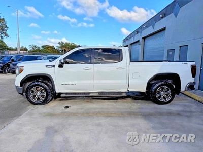 Zdjęcie 12 z 15 samochodu: 2021 GMC SIERRA K1500 SLE VIN:1GTU9BET4MZ191297 - miniatura