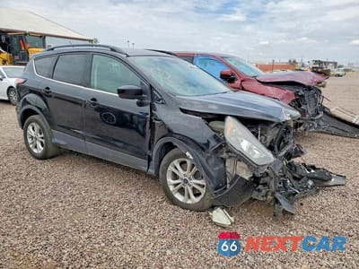 Czwarte zdjęcie samochodu z boku: 2018 FORD ESCAPE SE VIN:1FMCU9GD6JUA99492 - miniatura