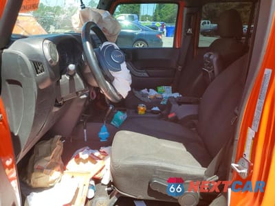 Zdjęcie 7 z 12 samochodu: 2015 JEEP WRANGLER UNLIMITED SPORT VIN:1C4BJWDG1FL674438 - miniatura