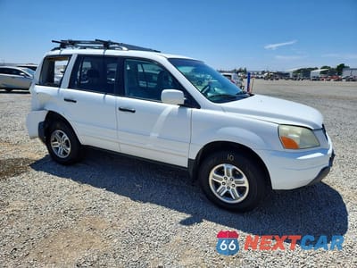 Czwarte zdjęcie samochodu z boku: 2005 HONDA PILOT EXL VIN:5FNYF18585B039385 - miniatura