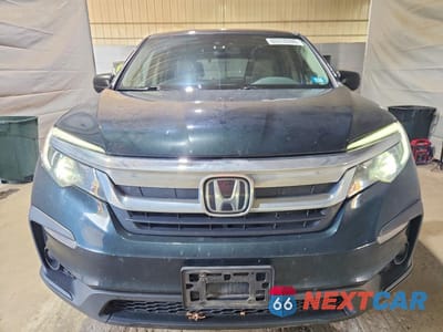 Piąte zdjęcie samochodu w środku: 2019 HONDA PILOT LX VIN:5FNYF6H10KB056445 - miniatura