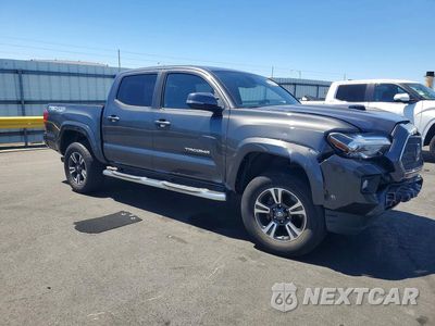 Czwarte zdjęcie samochodu z boku: 2018 TOYOTA TACOMA TRD SPORT VIN:3TMCZ5AN3JM168207 - miniatura