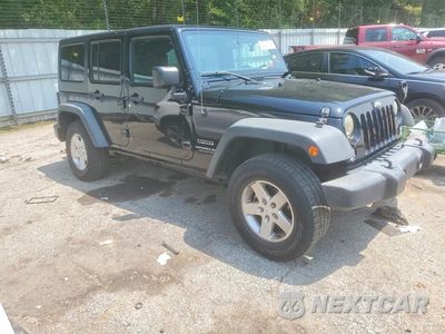 Czwarte zdjęcie samochodu z boku: 2016 JEEP WRANGLER UNLIMITED SPORT VIN:1C4BJWDG3GL115667 - miniatura