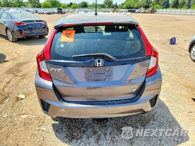Zdjęcie 6 z 12 samochodu: 2016 HONDA FIT LX VIN:JHMGK5H53GX034830 - miniatura