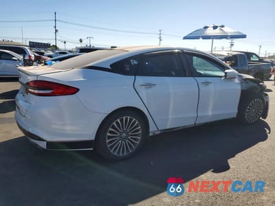 Trzecie zdjęcie samochodu z tyłu: 2017 FORD FUSION TITANIUM HEV VIN:3FA6P0RU3HR315954 - miniatura