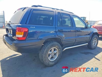 Trzecie zdjęcie samochodu z tyłu: 2000 JEEP GRAND CHEROKEE LAREDO VIN:1J4GW48S1YC195685 - miniatura