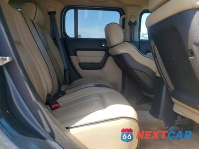 Zdjęcie 11 z 14 samochodu: 2006 HUMMER H3 VIN:5GTDN136468173189 - miniatura