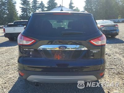 Zdjęcie 6 z 14 samochodu: 2014 FORD ESCAPE TITANIUM VIN:1FMCU9J96EUC70333 - miniatura