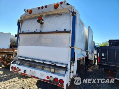 Trzecie zdjęcie samochodu z tyłu: 2003 FREIGHTLINER FL70 PACKER GARBAGE TRUCK VIN:1FVABTBV43HK82615 - miniatura