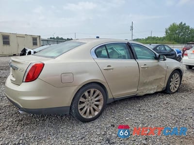 Trzecie zdjęcie samochodu z tyłu: 2010 LINCOLN MKS VIN:1LNHL9DR4AG611757 - miniatura