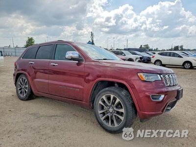 Czwarte zdjęcie samochodu z boku: 2017 JEEP GRAND CHEROKEE OVERLAND VIN:1C4RJFCG4HC607187 - miniatura
