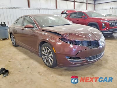 Czwarte zdjęcie samochodu z boku: 2015 LINCOLN MKZ HYBRID VIN:3LN6L2LU0FR627832 - miniatura
