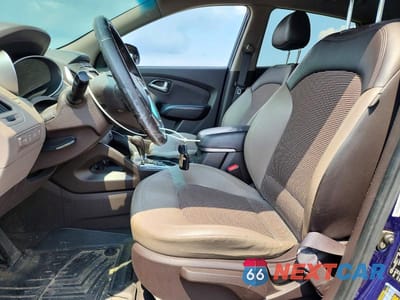 Zdjęcie 7 z 13 samochodu: 2012 HYUNDAI TUCSON GLS VIN:KM8JUCAC2CU418961 - miniatura