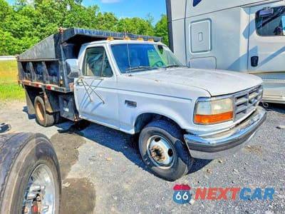 Czwarte zdjęcie samochodu z boku: 1995 FORD F350 SUPER DUTY DUMP TRUCK VIN:1FDJF37G4SEA06893 - miniatura