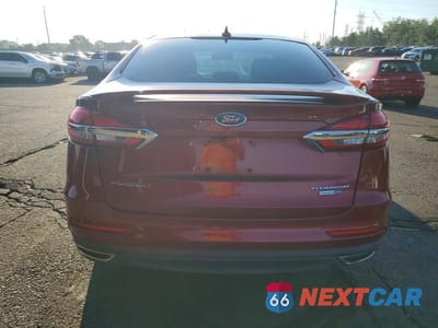 Zdjęcie 6 z 12 samochodu: 2019 FORD FUSION TITANIUM VIN:3FA6P0D97KR210893 - miniatura