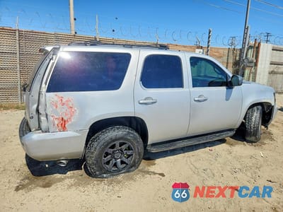 Trzecie zdjęcie samochodu z tyłu: 2011 CHEVROLET TAHOE C1500 LT VIN:1GNSCBE00BR111724 - miniatura