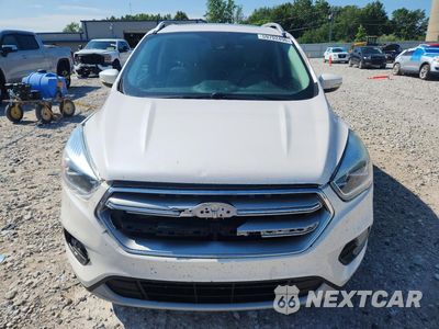 Piąte zdjęcie samochodu w środku: 2017 FORD ESCAPE TITANIUM VIN:1FMCU9J99HUA33386 - miniatura