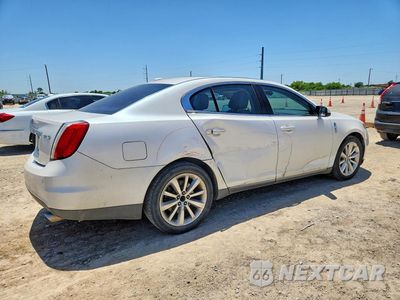 Trzecie zdjęcie samochodu z tyłu: 2012 LINCOLN MKS VIN:1LNHL9DR0CG804328 - miniatura