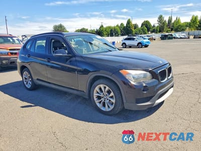Czwarte zdjęcie samochodu z boku: 2014 BMW X1 XDRIVE28I VIN:WBAVL1C55EVY16400 - miniatura