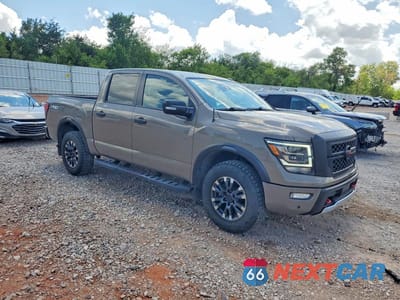 Czwarte zdjęcie samochodu z boku: 2021 NISSAN TITAN PRO-4X VIN:1N6AA1ED1MN524752 - miniatura