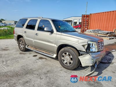 Czwarte zdjęcie samochodu z boku: 2003 CADILLAC ESCALADE LUXURY VIN:1GYEK63N53R281362 - miniatura