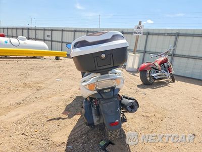 Czwarte zdjęcie samochodu z boku: 2009 KYMCO USA INC XCITING 500I VIN:RFBT7S3799B300427 - miniatura