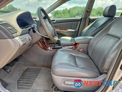 Zdjęcie 7 z 12 samochodu: 2006 TOYOTA CAMRY XLE VIN:4T1BE30KX6U658192 - miniatura