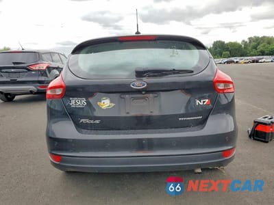Zdjęcie 6 z 12 samochodu: 2015 FORD FOCUS TITANIUM VIN:1FADP3N22FL222111 - miniatura