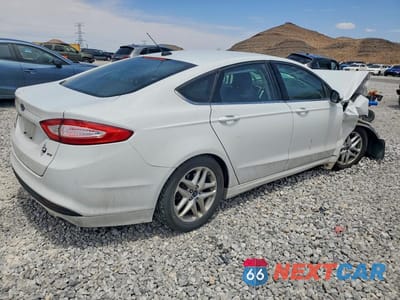 Trzecie zdjęcie samochodu z tyłu: 2016 FORD FUSION SE VIN:3FA6P0H77GR175496 - miniatura