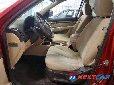 Zdjęcie 7 z 14 samochodu: 2010 HYUNDAI SANTA FE GLS VIN:5NMSGDAB8AH346942 - miniatura