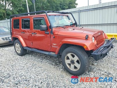 Czwarte zdjęcie samochodu z boku: 2009 JEEP WRANGLER UNLIMITED SAHARA VIN:1J8GA59189L778796 - miniatura