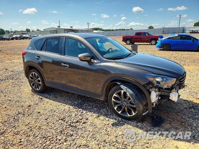 Czwarte zdjęcie samochodu z boku: 2016 MAZDA CX-5 GT VIN:JM3KE2DY0G0703461 - miniatura