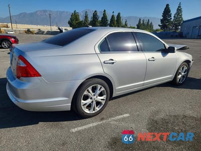 Trzecie zdjęcie samochodu z tyłu: 2012 FORD FUSION SE VIN:3FAHP0HAXCR145200 - miniatura