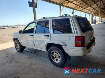 Drugie zdjęcie samochodu z przodu: 1998 JEEP GRAND CHEROKEE LIMITED VIN:1J4GZ78YXWC322296 - miniatura