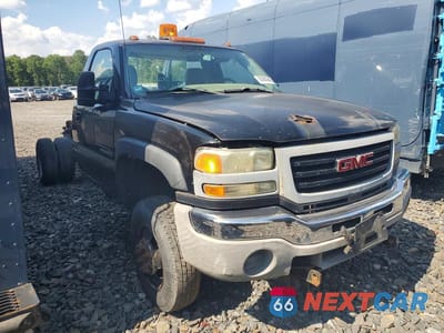 Czwarte zdjęcie samochodu z boku: 2004 GMC NEW SIERRA C3500 VIN:1GDJC34U24E285170 - miniatura